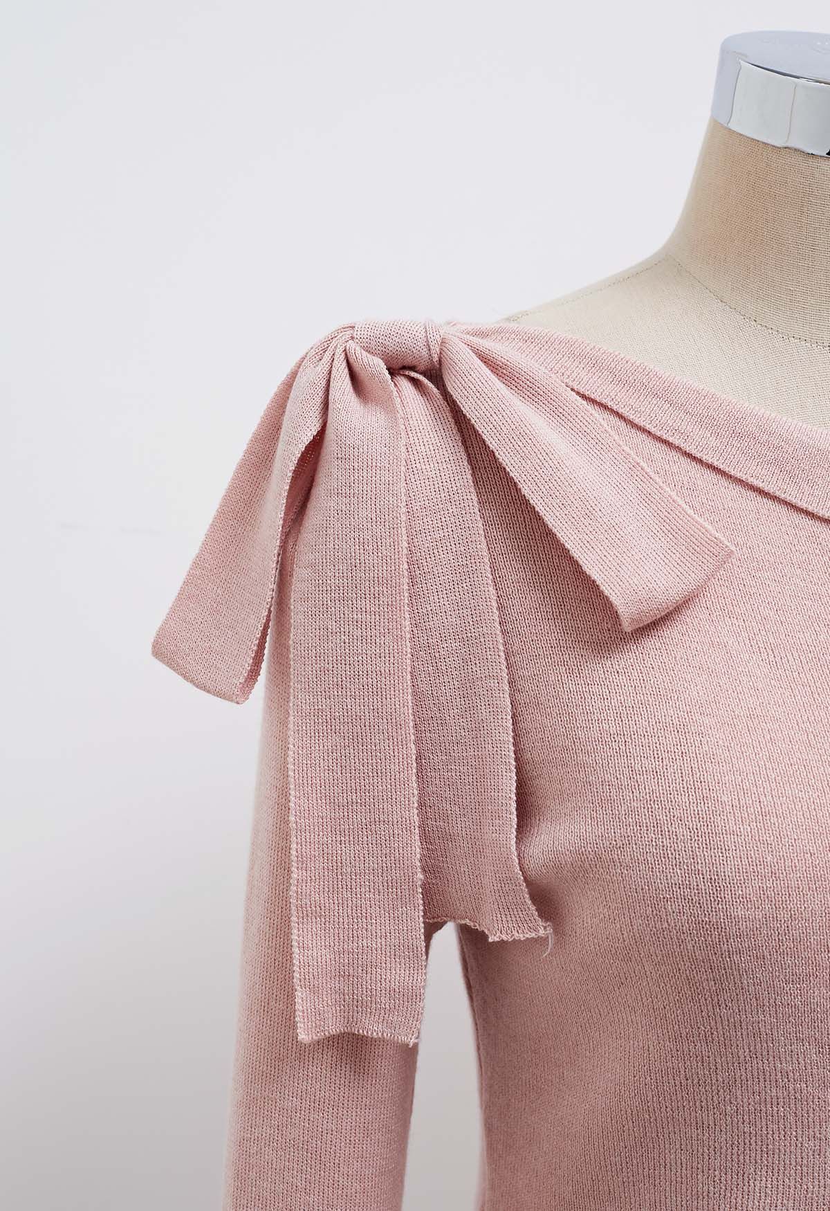 Blusa de punto con cordón ajustable en la cintura y decoración con lazo lateral en color rosa