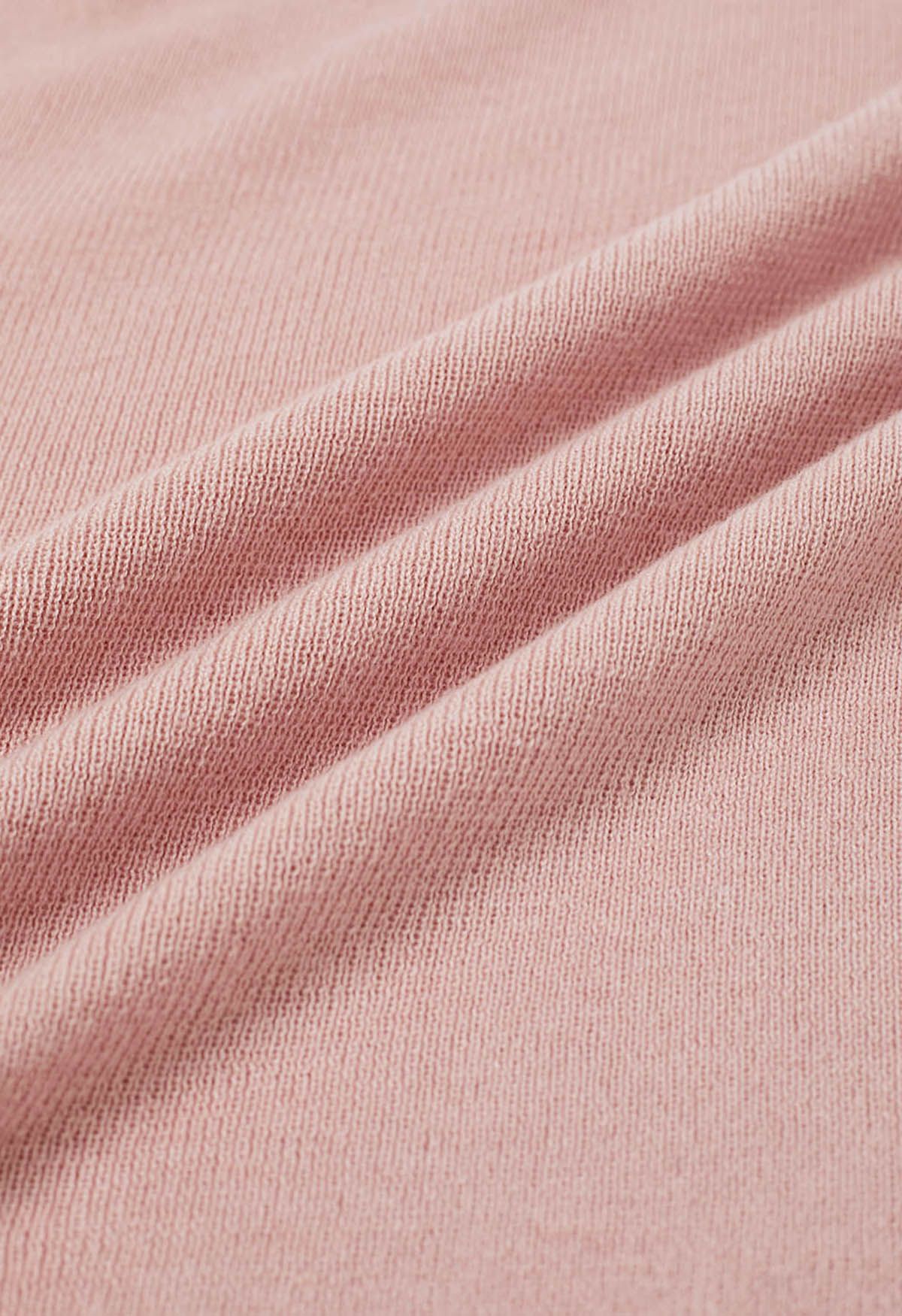 Blusa de punto con cordón ajustable en la cintura y decoración con lazo lateral en color rosa