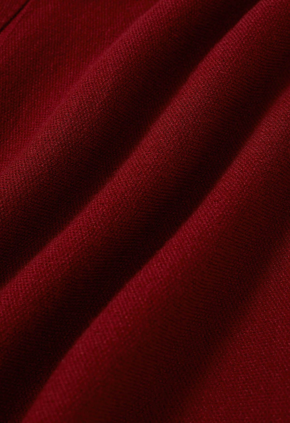 Minifalda de punto con pliegues laterales en color rojo