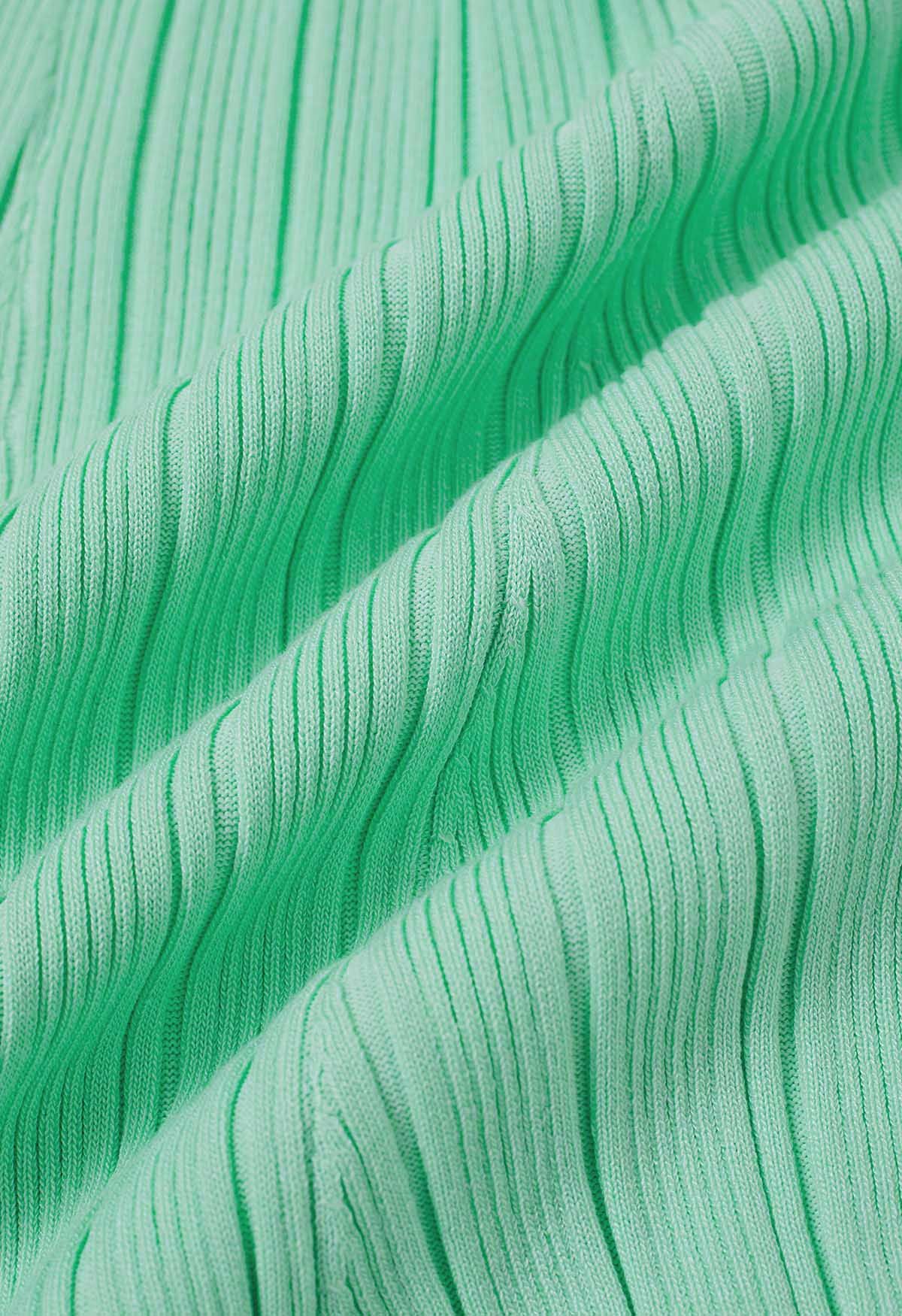 Vestido relajante de punto acanalado con cuello y bolsillos con solapa en color menta