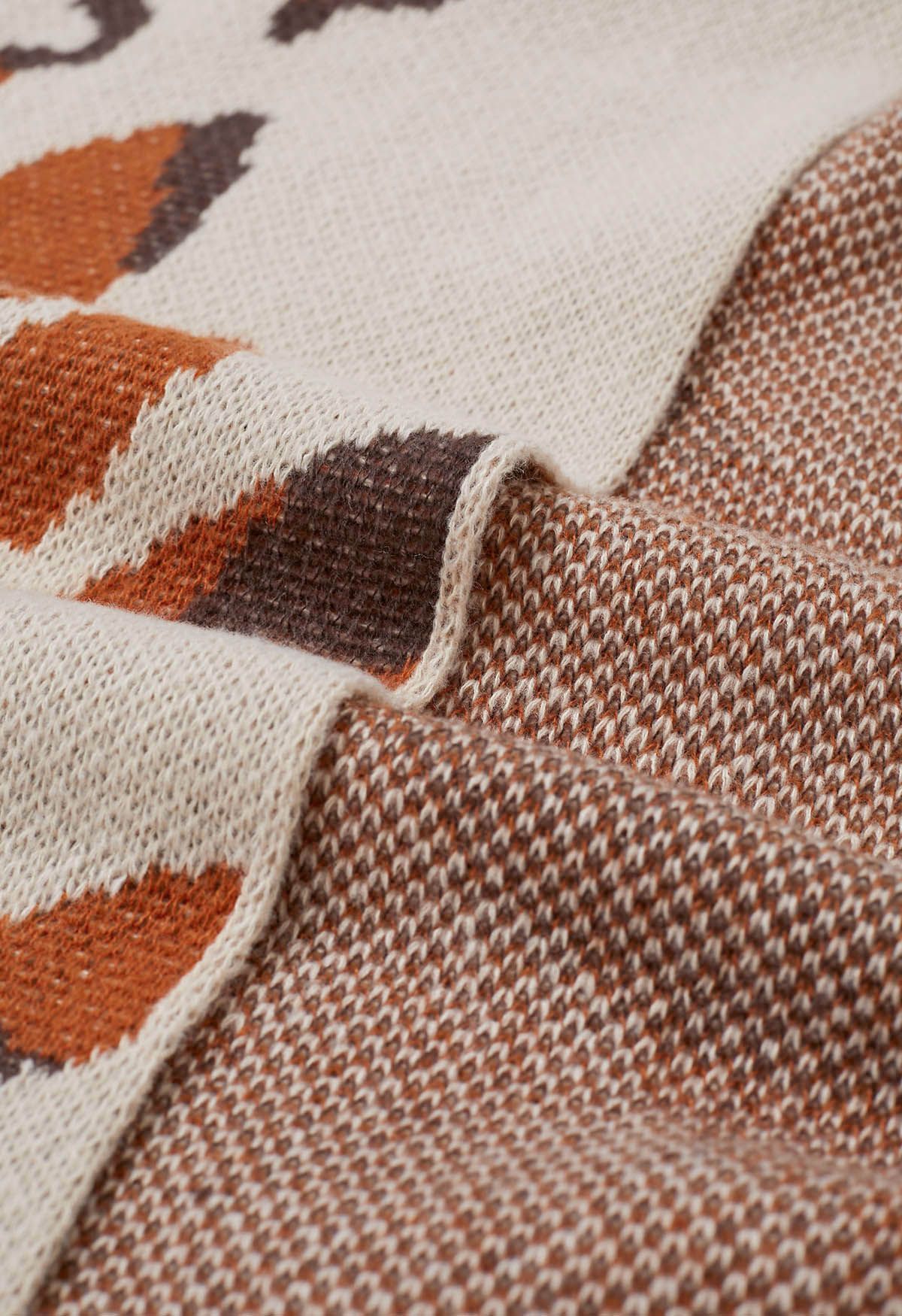 Poncho con flecos abstractos en tonos otoñales