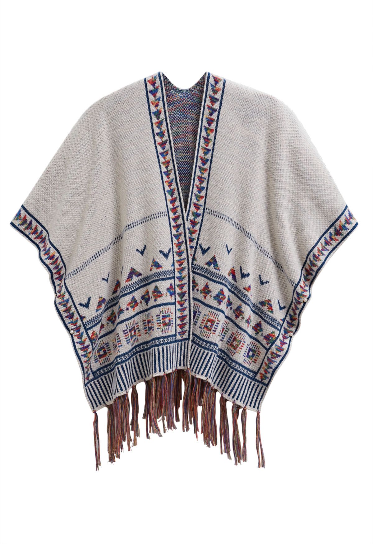 Poncho de punto con flecos Boho Wanderer en color marfil