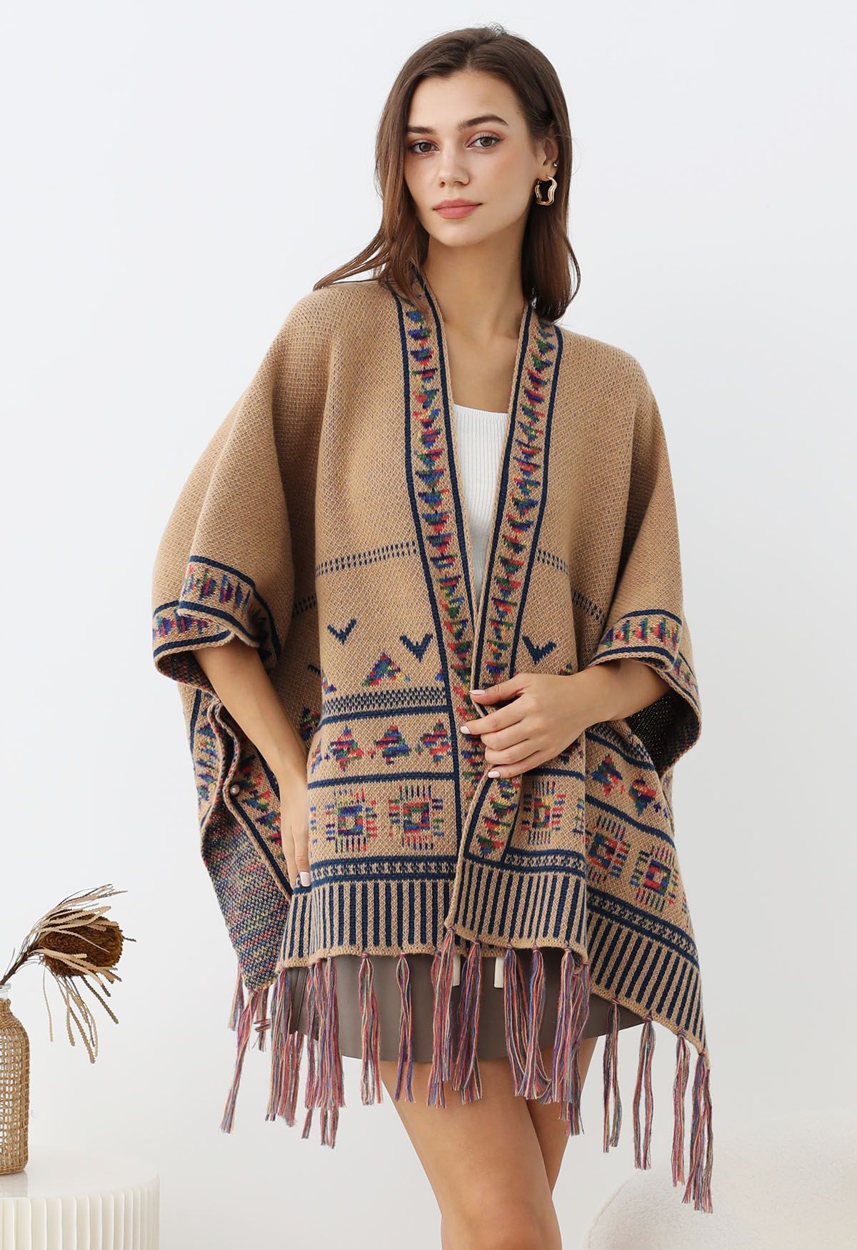 Poncho de punto con flecos Boho Wanderer en color camel