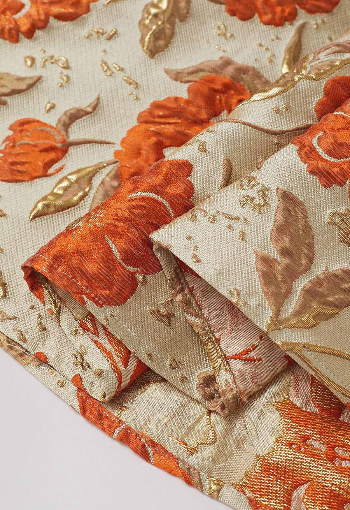 Falda midi plisada con vuelo y estampado floral en jacquard en color naranja