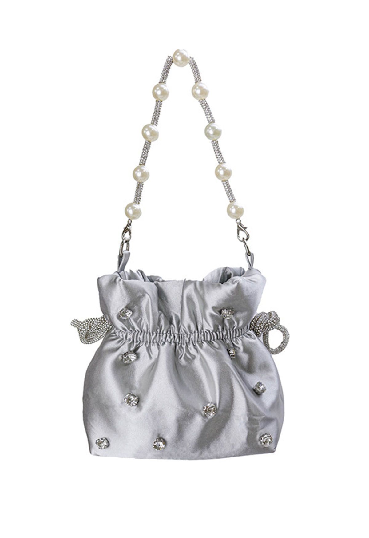 Bolso de hombro con cordón y decoración de diamantes de imitación en color gris