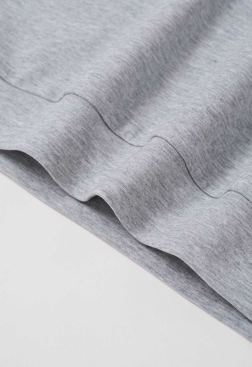 Sudadera corta con mangas adornadas con lazo en gris