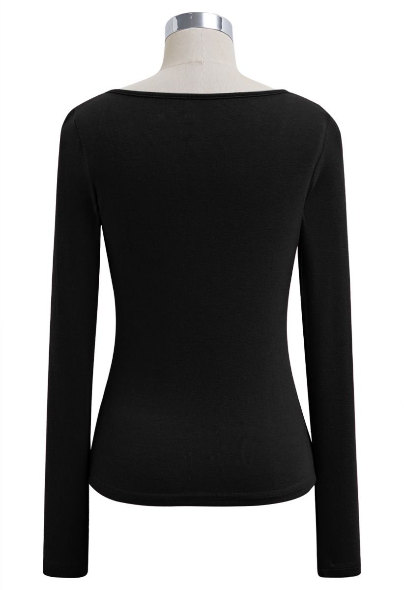 Blusa ajustada de manga larga con escote de flores 3D en color negro