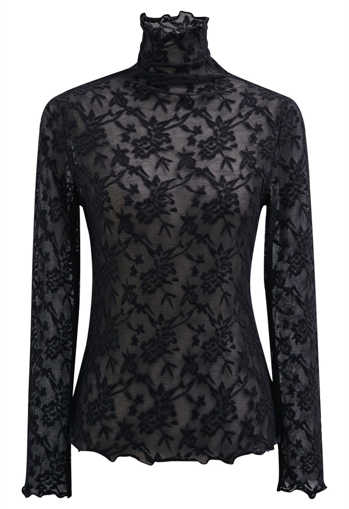 Blusa de manga larga con cuello alto y malla con estampado floral de fantasía en color negro