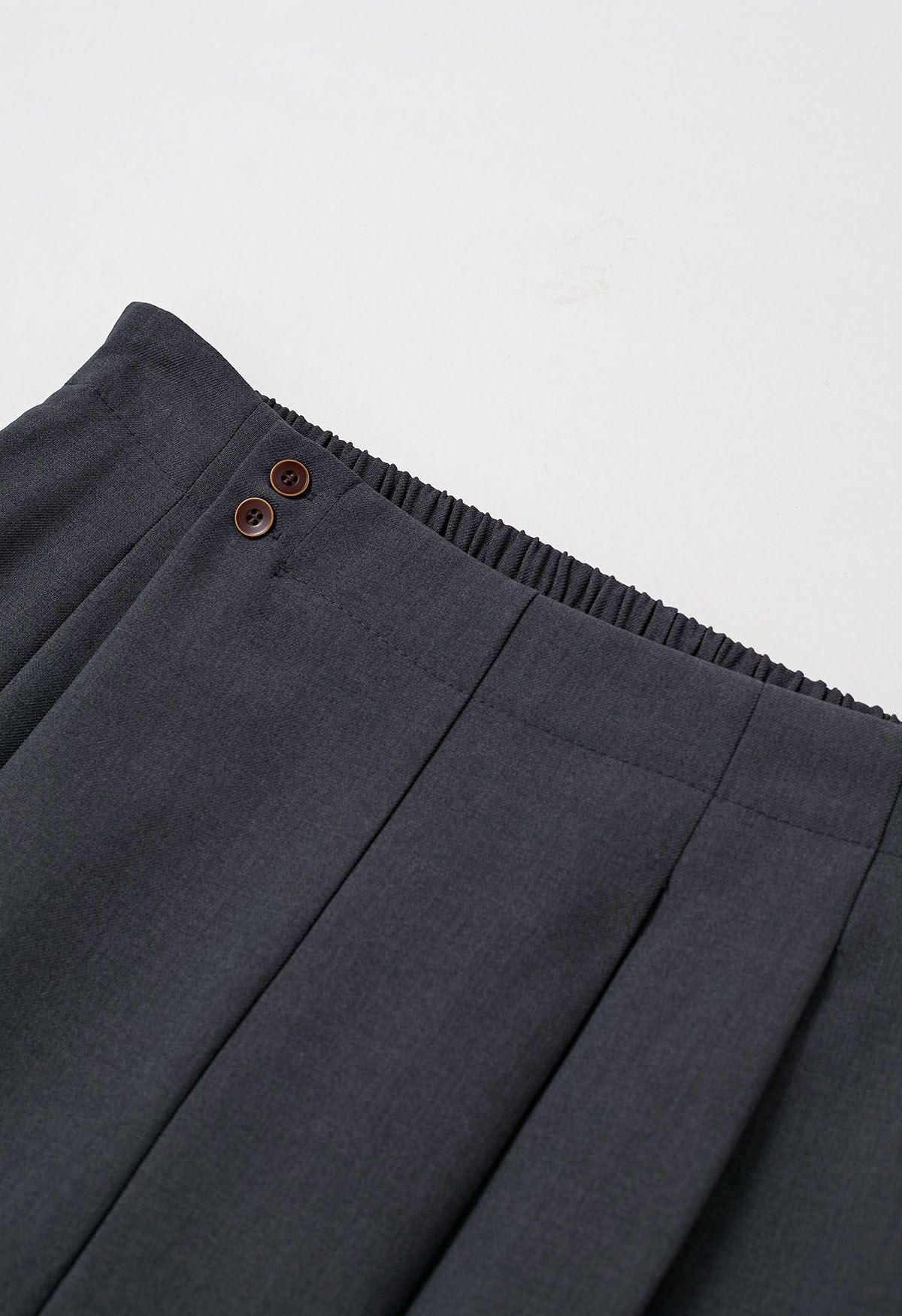 Pantalones palazzo con pliegues y botones, de estilo elegante y sencillo, en gris