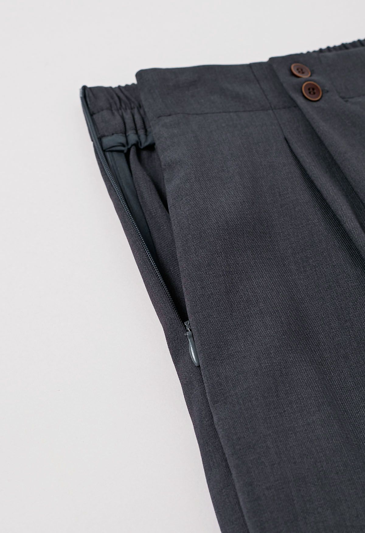 Pantalones palazzo con pliegues y botones, de estilo elegante y sencillo, en gris