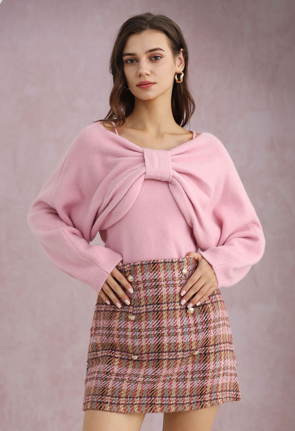 Fascinante conjunto de top y suéter con lazo en color rosa