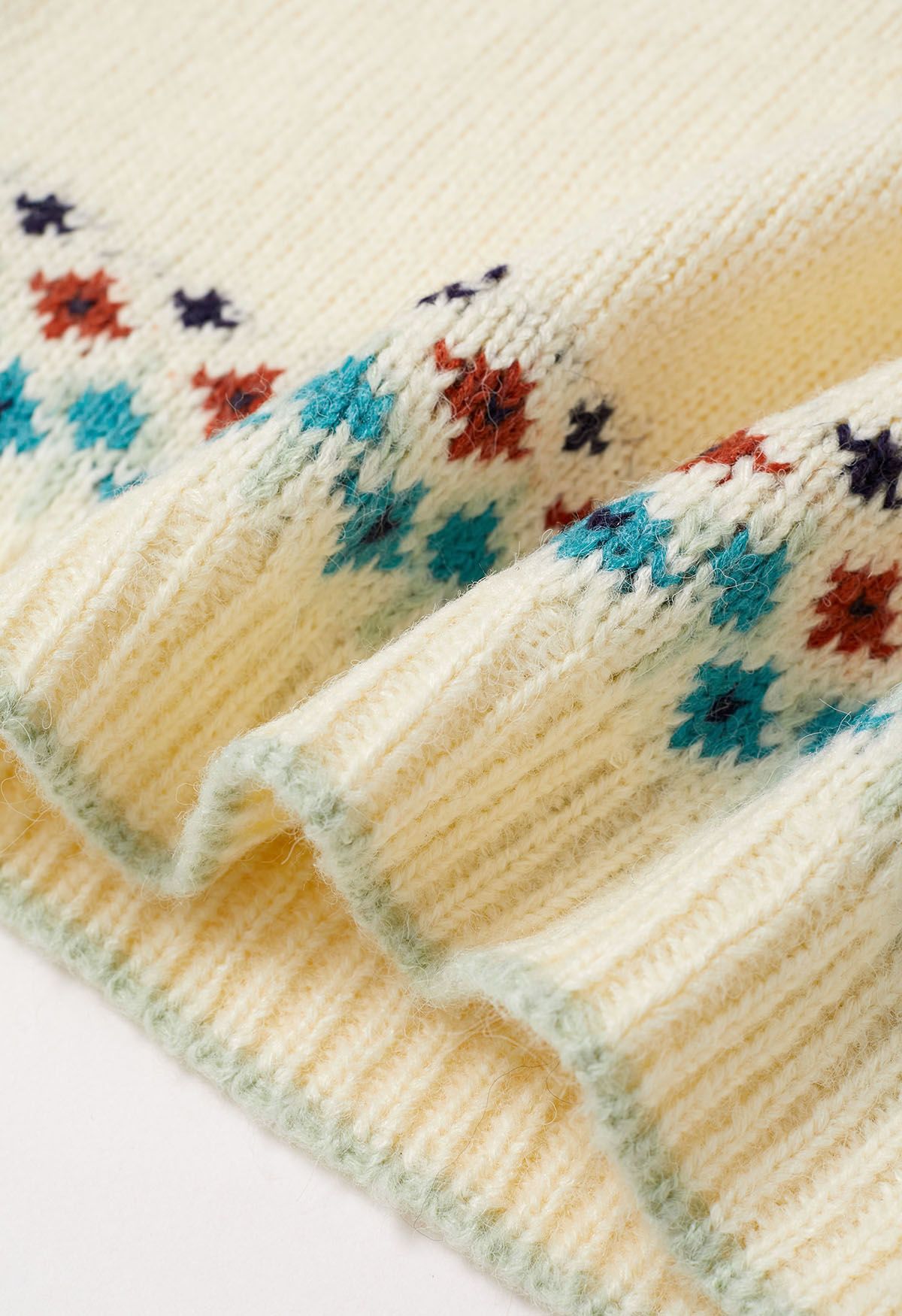 Suéter de punto Fair Isle de Snowflake Wonderland en color crema