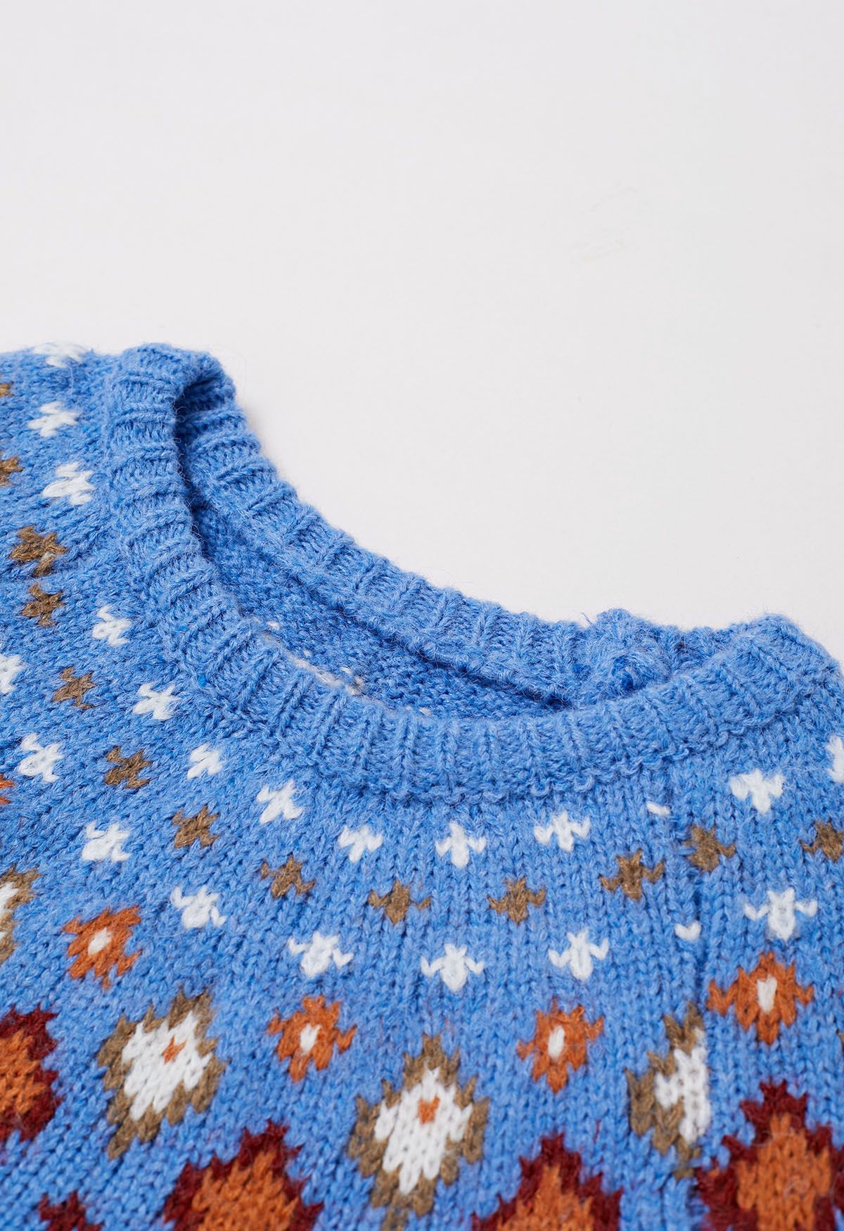 Suéter de punto Fair Isle de Snowflake Wonderland en azul