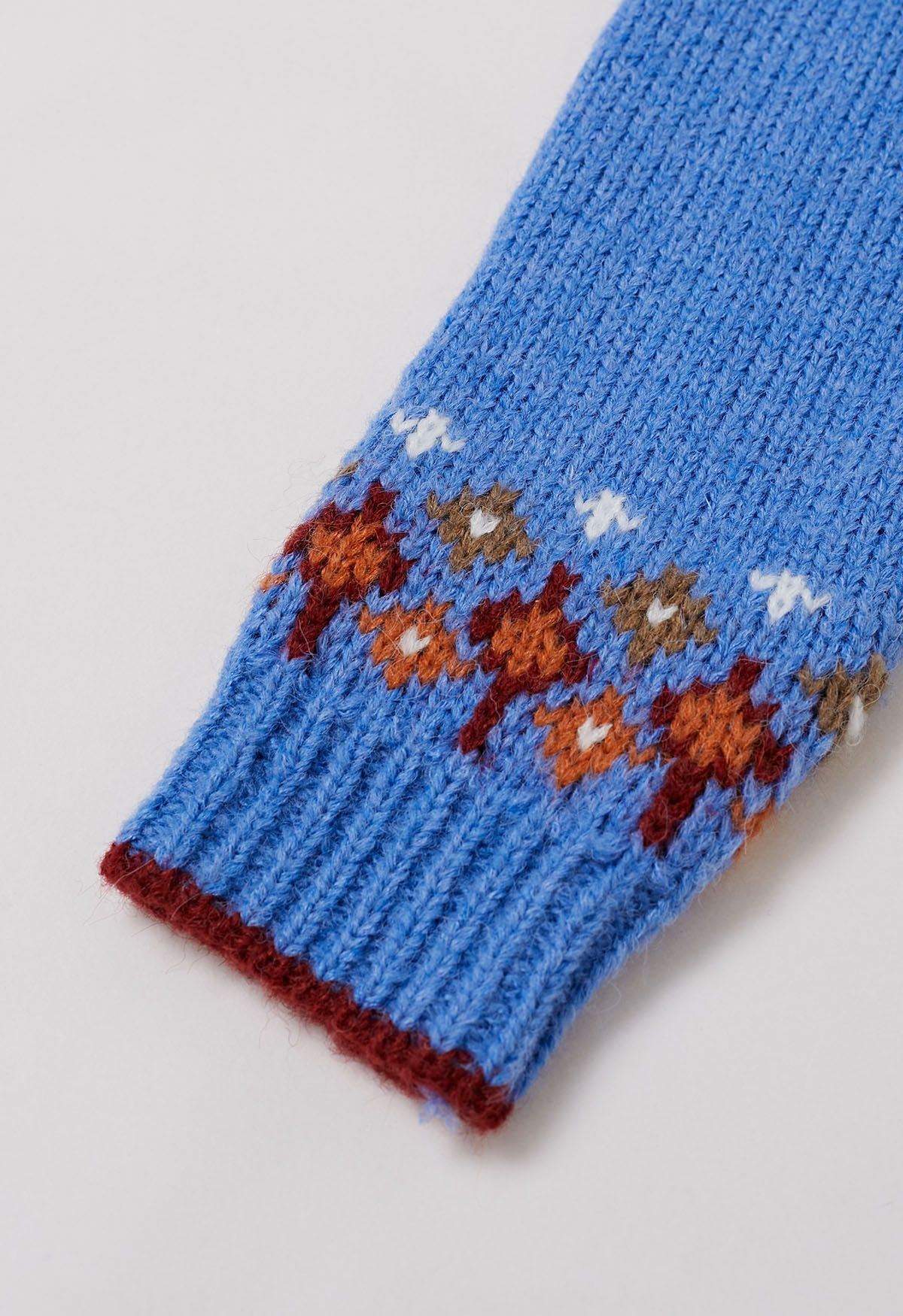 Suéter de punto Fair Isle de Snowflake Wonderland en azul