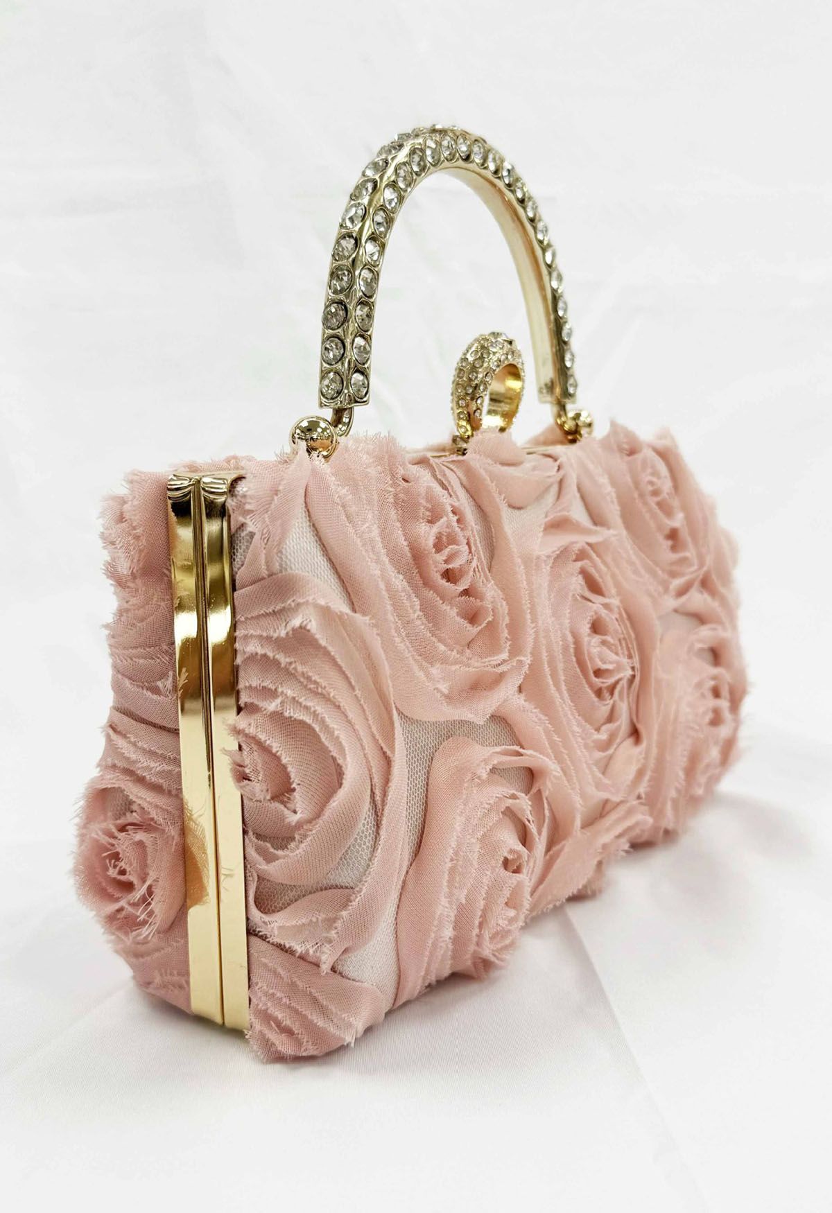 Bolso de mano con asa de diamantes de imitación en rosa opulento