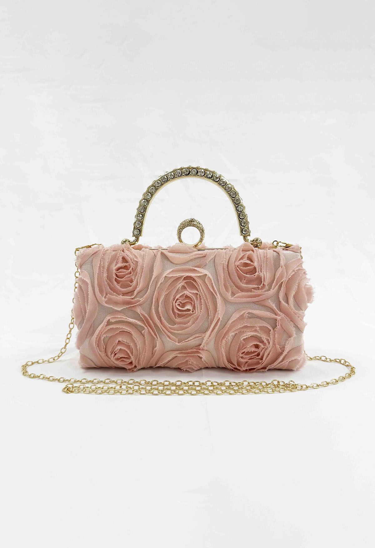 Bolso de mano con asa de diamantes de imitación en rosa opulento