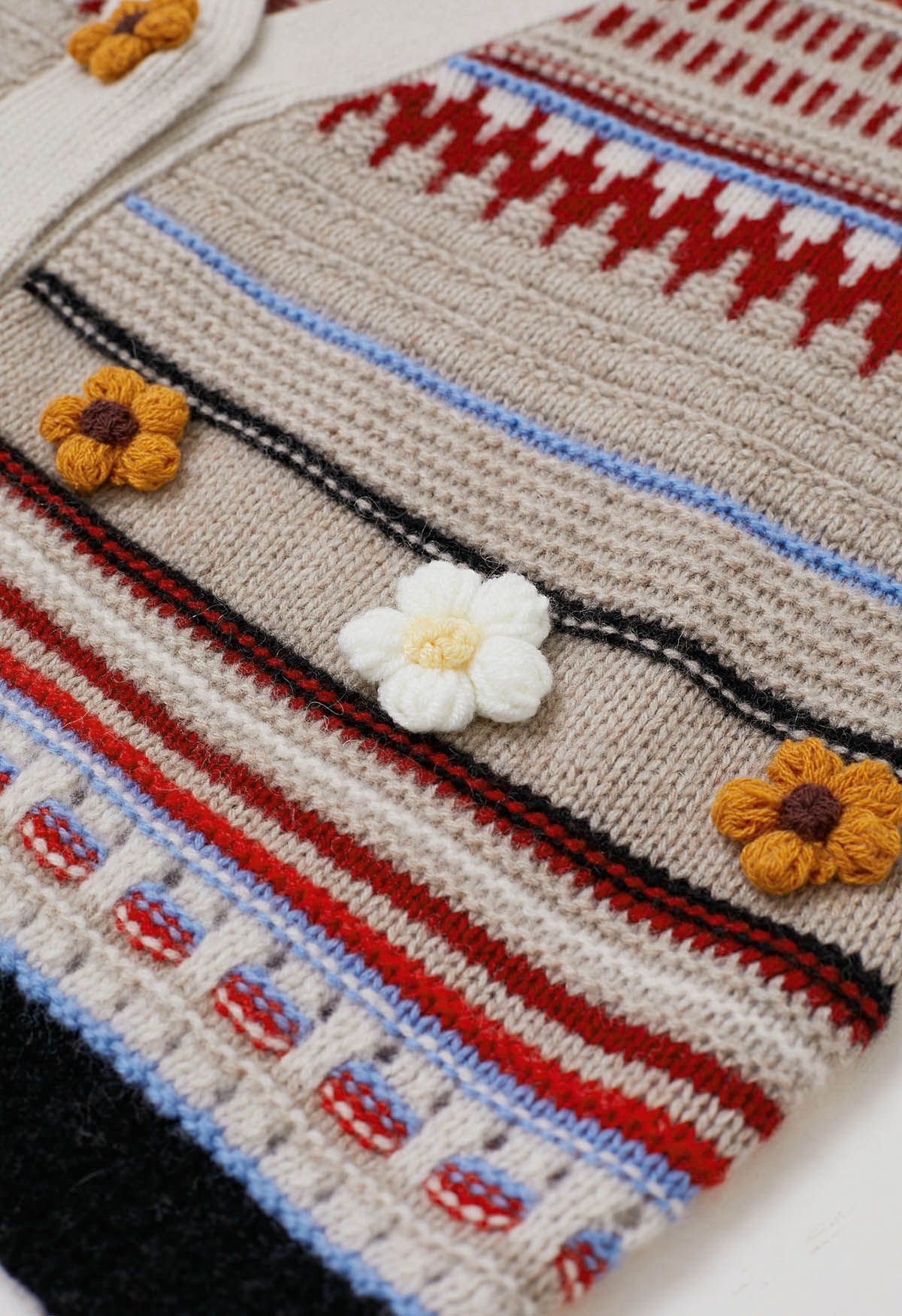 Cárdigan de lana Fair Isle con estampado de flores de Stitch en color avena