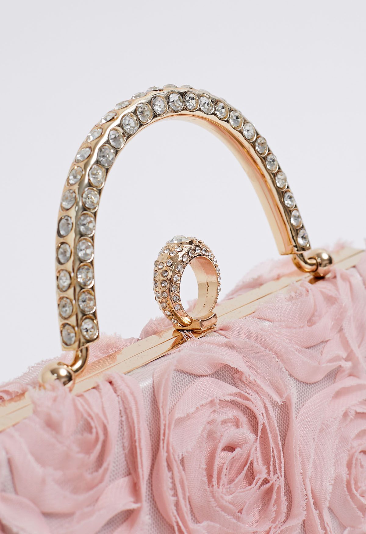 Bolso de mano con asa de diamantes de imitación en rosa opulento