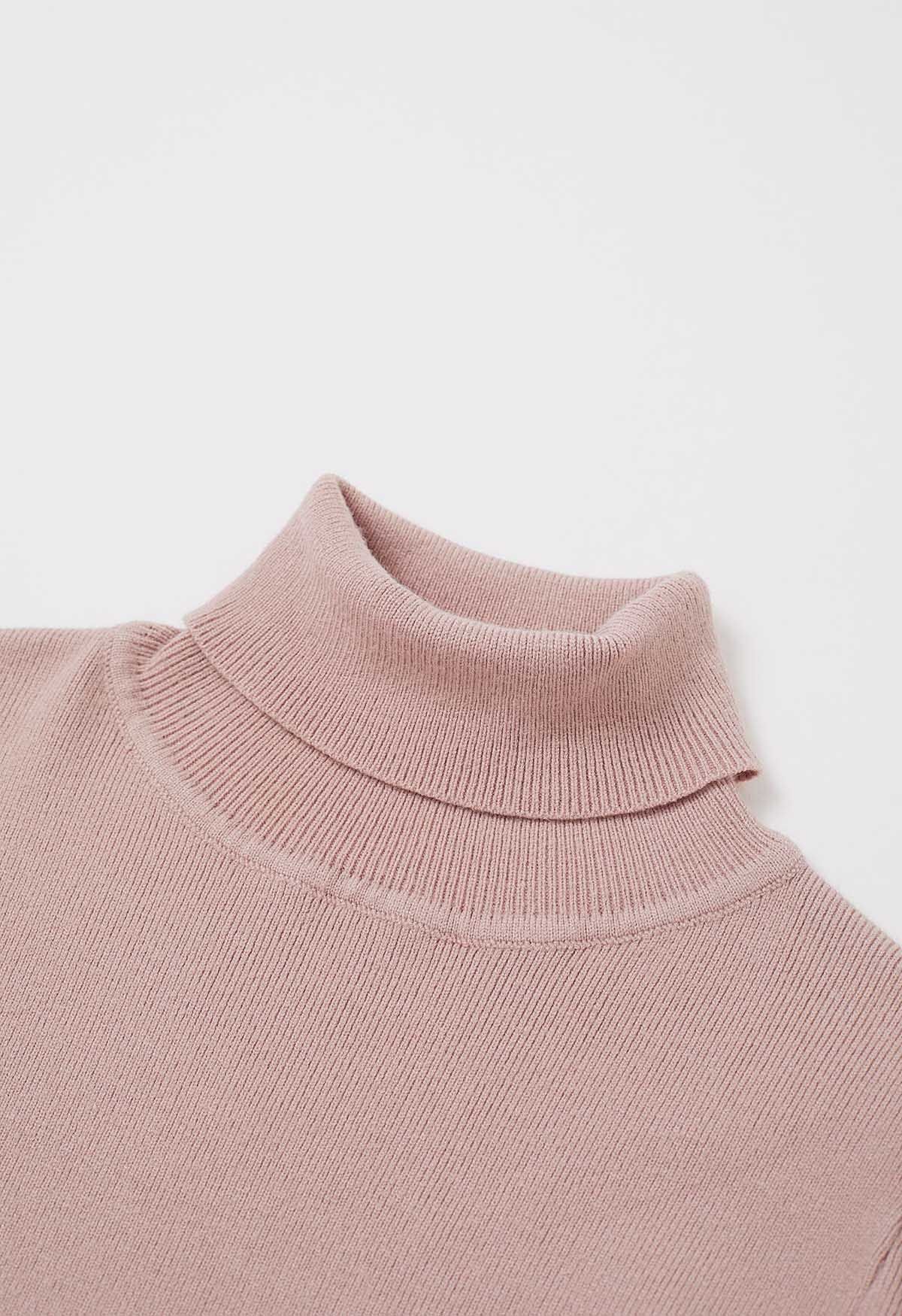 Blusa de punto con cuello alto y mangas cortas en color rosa polvoriento