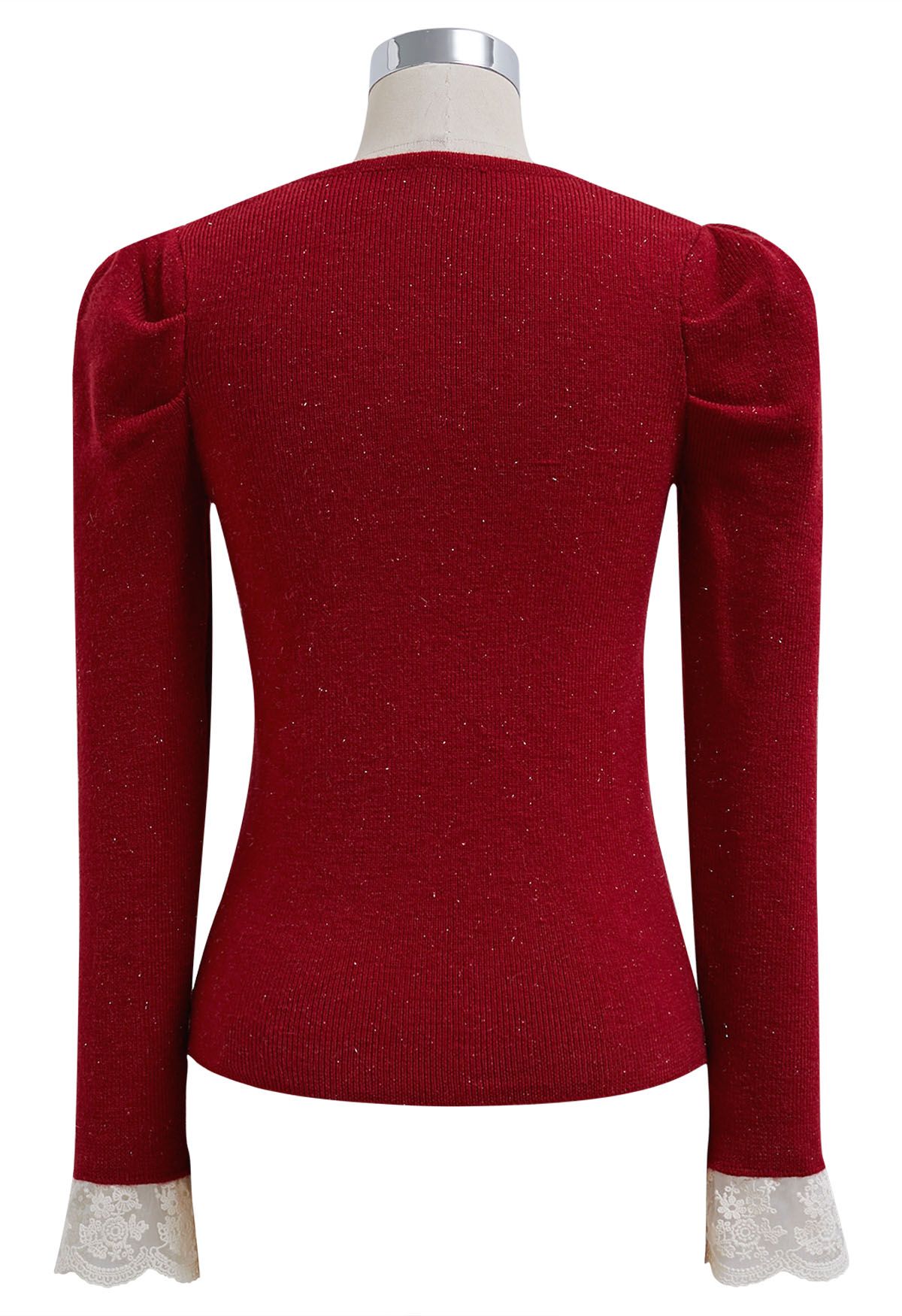 Blusa de punto con puños de encaje y lazo delicado en rojo