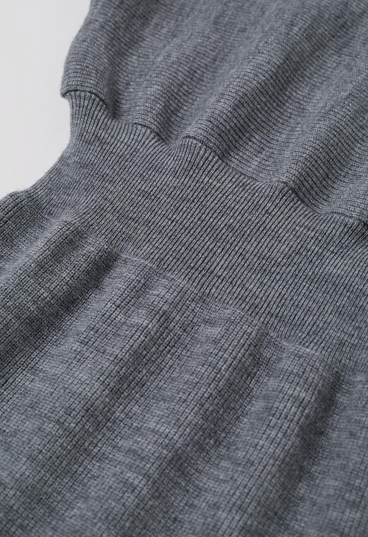 Vestido de punto con cintura ceñida y mangas de murciélago en color gris