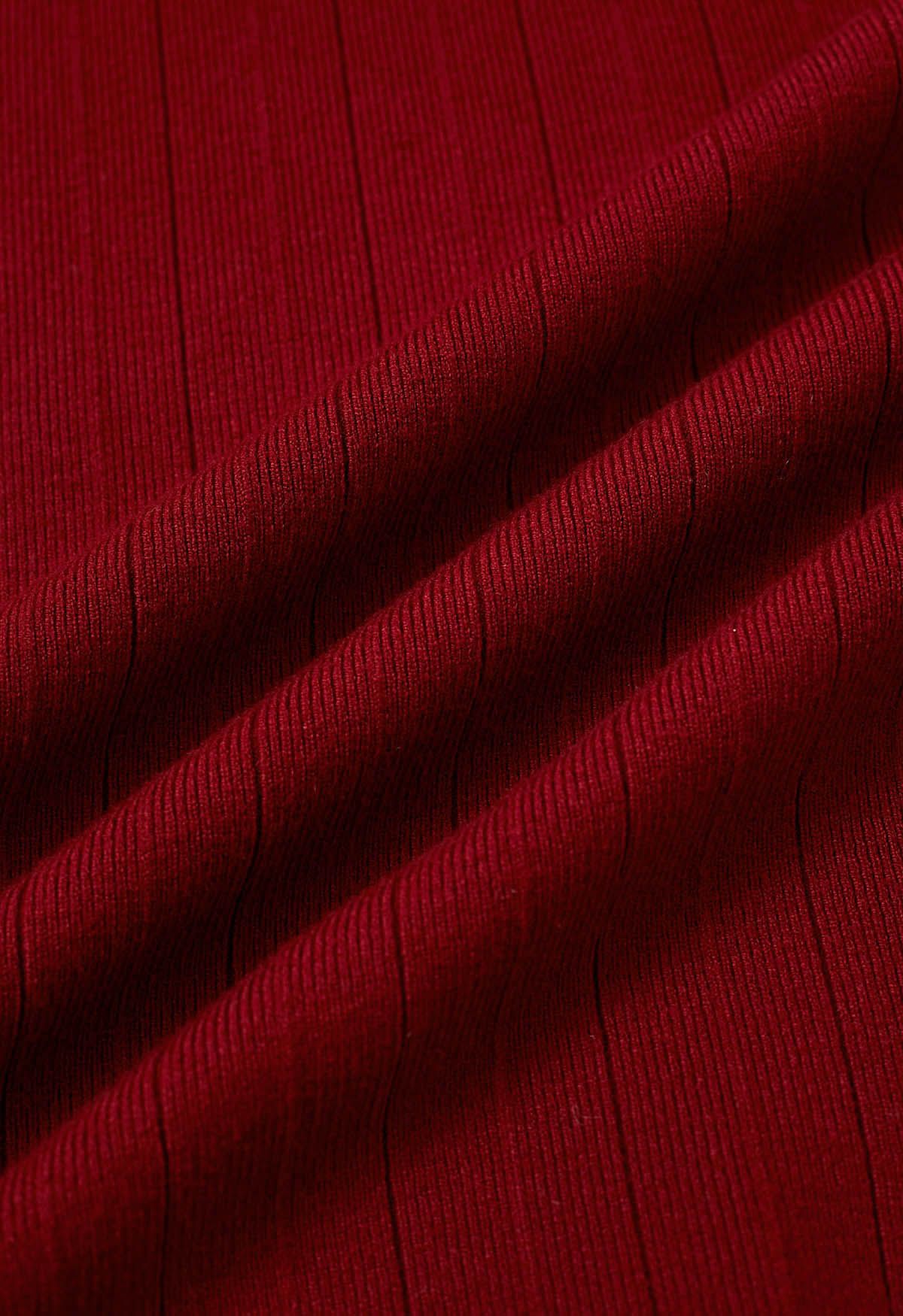 Vestido midi de punto cruzado con escote en V y efecto en forma de V en color rojo