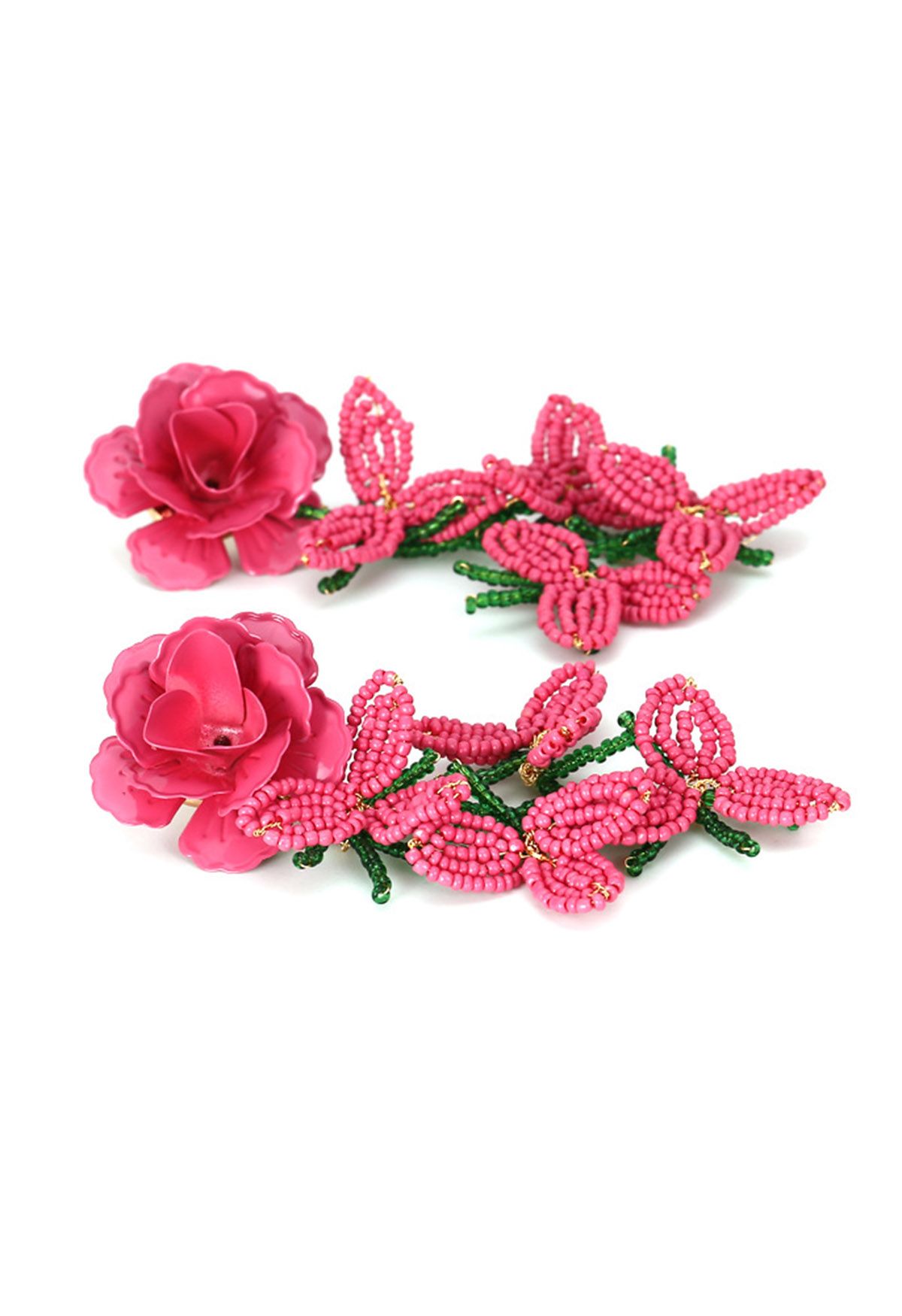 Aretes de flores con cuentas rosadas