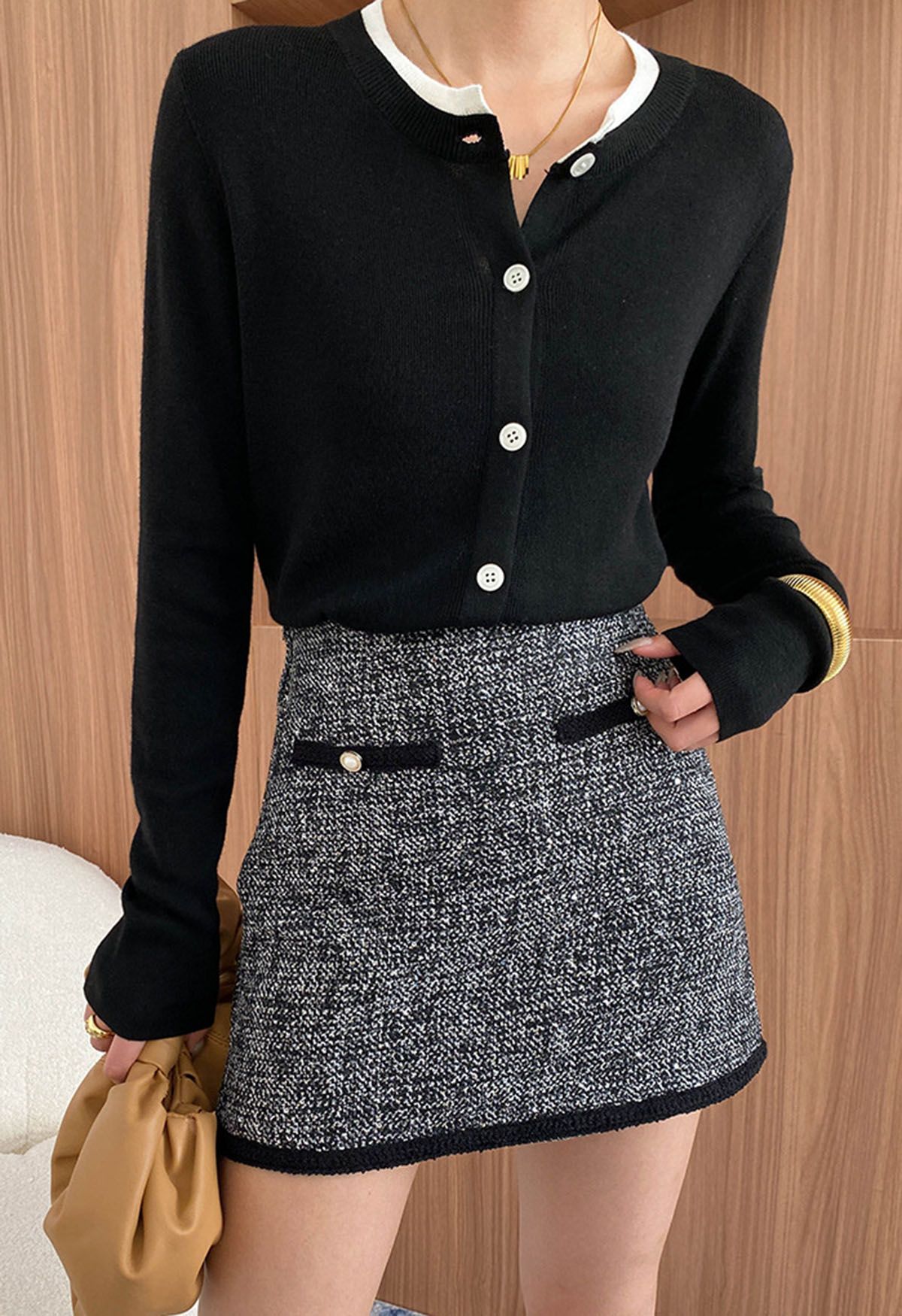 Falda corta de tweed con borde en contraste