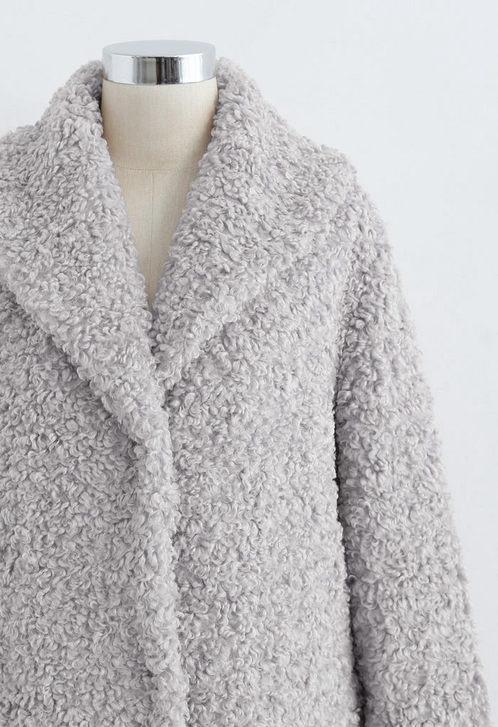 Sensación de calidez Abrigo largo de piel sintética en gris