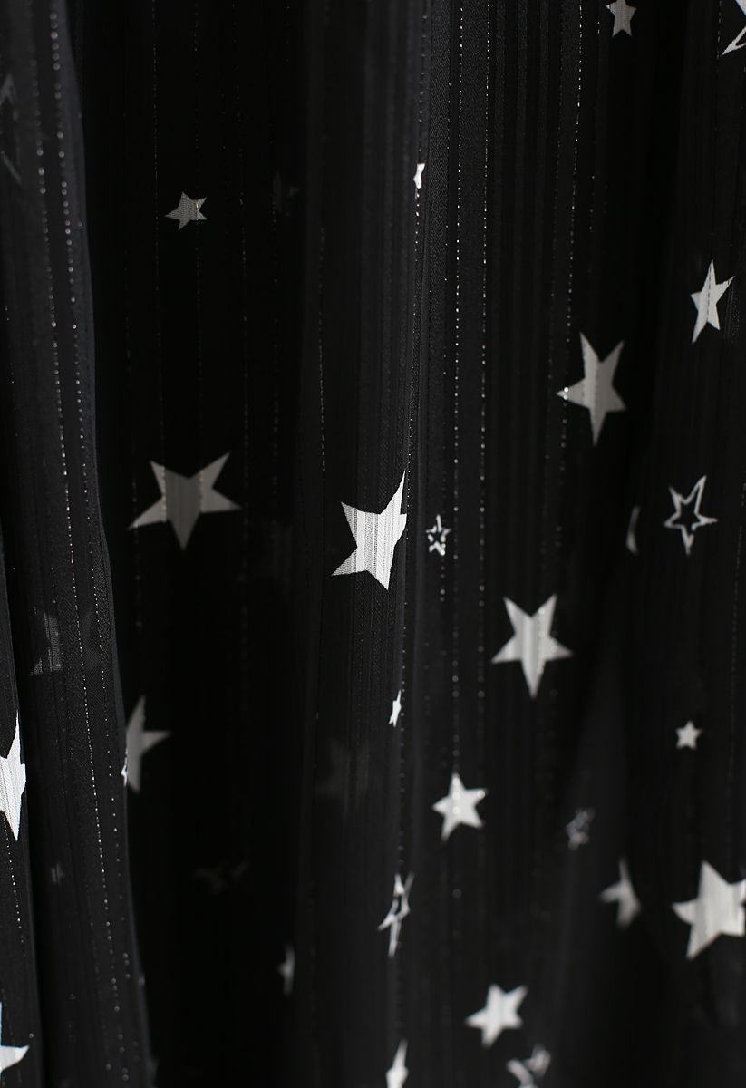 Su top semitransparente Bowknot de Sassy Star en negro