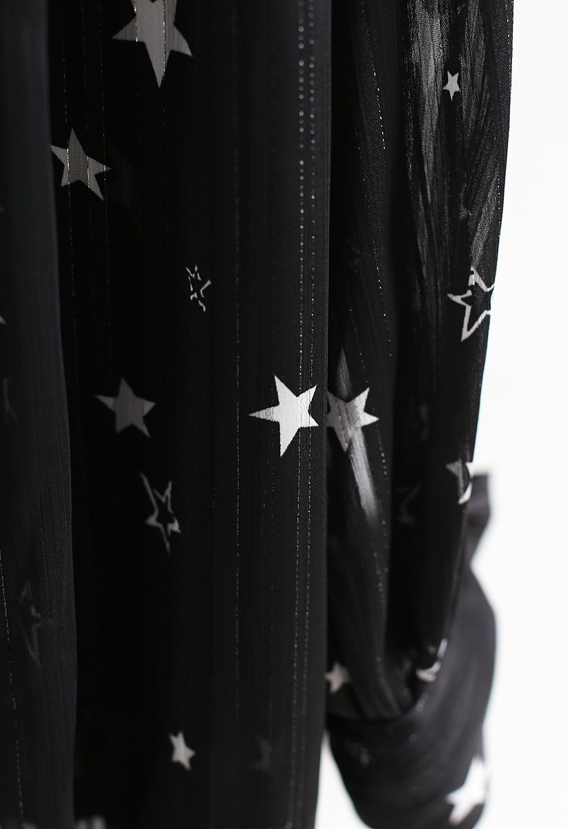 Su top semitransparente Bowknot de Sassy Star en negro