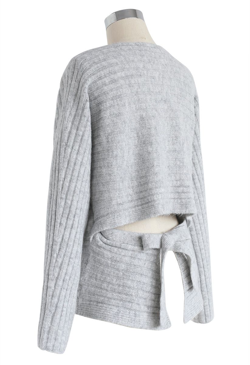 Suéter de punto acanalado con aberturas en gris