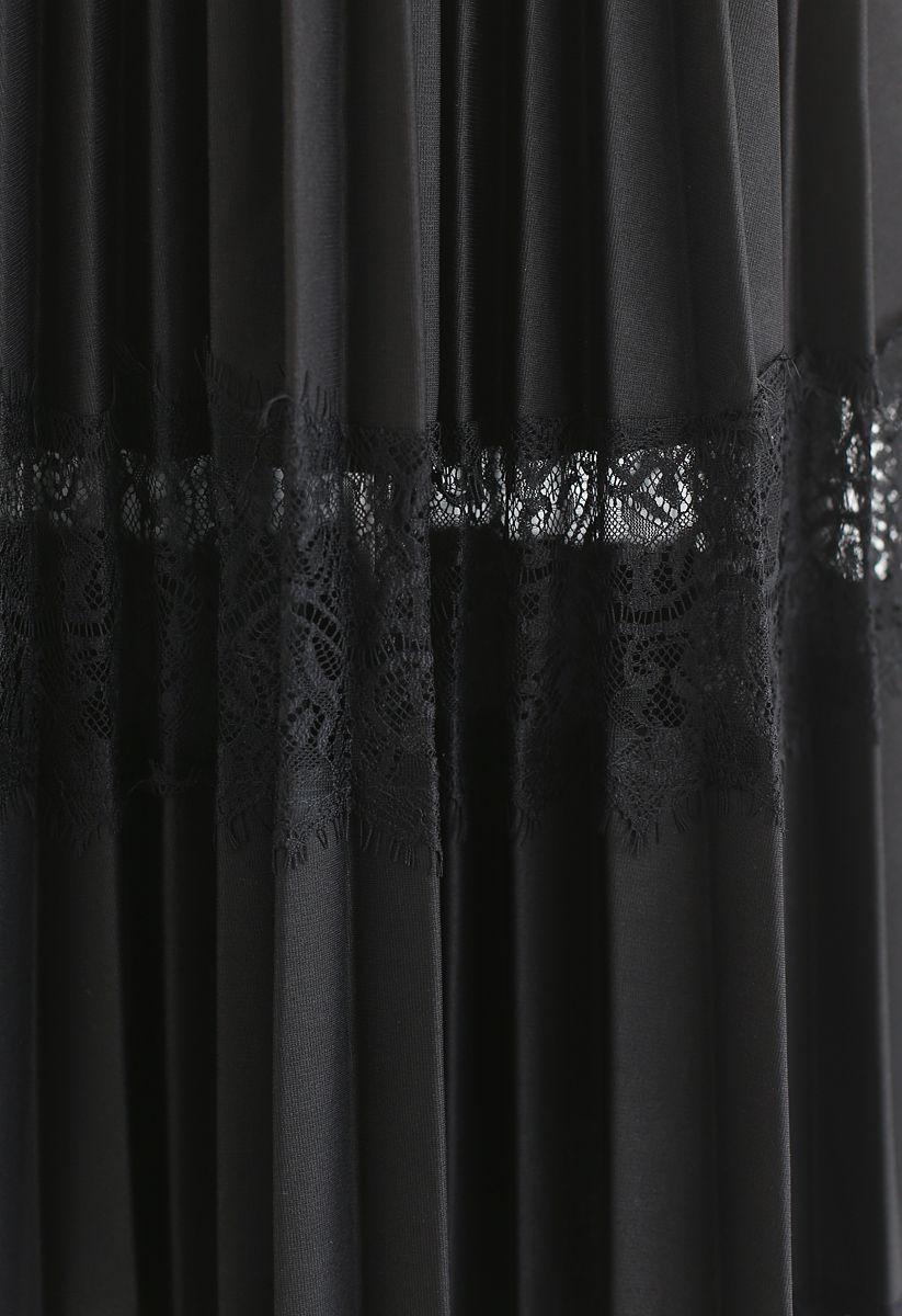 Falda midi plisada de encaje en negro
