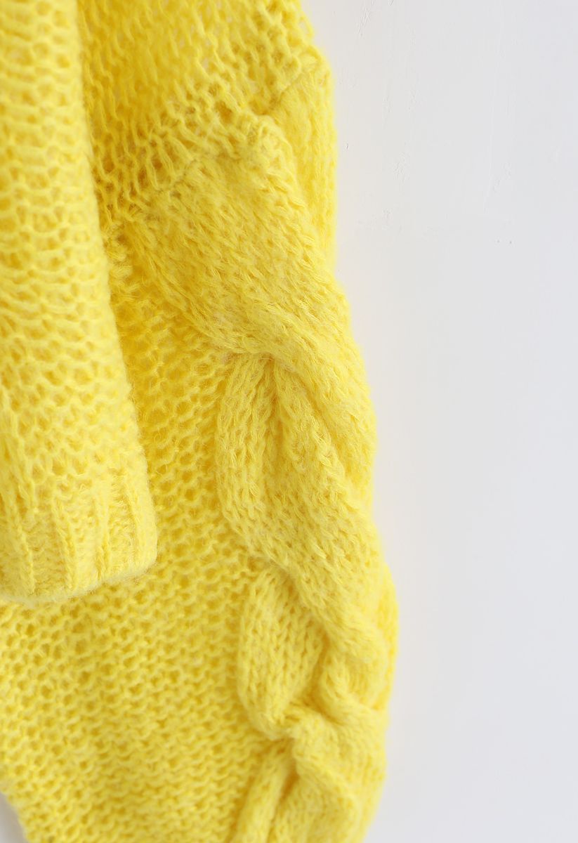 Jersey de mangas de hojaldre tejido a mano en amarillo