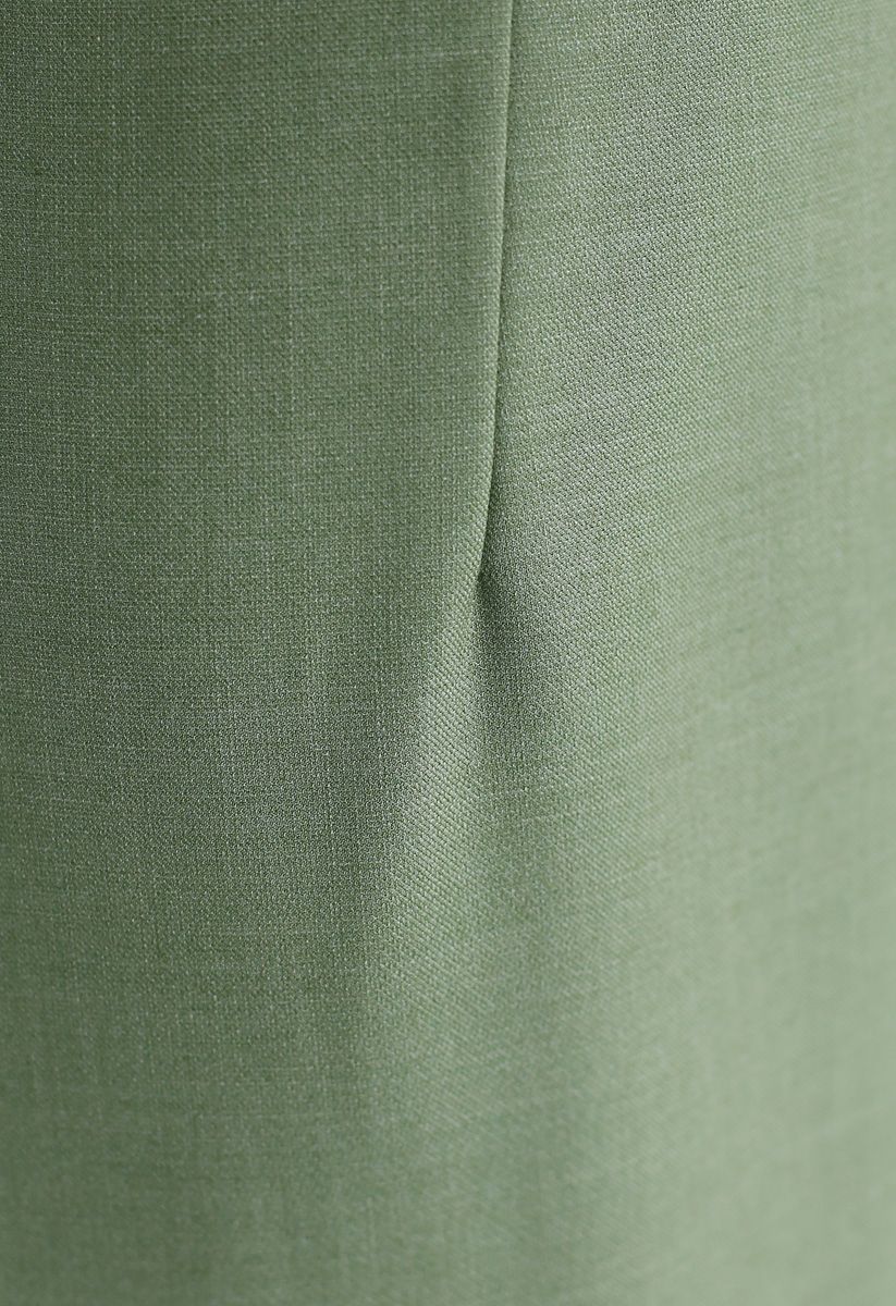 Falda lápiz con dobladillo dividido en color base en verde