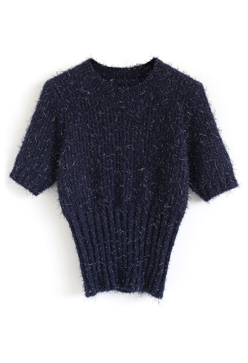 Suéter de punto de manga corta brillante y esponjoso en azul marino