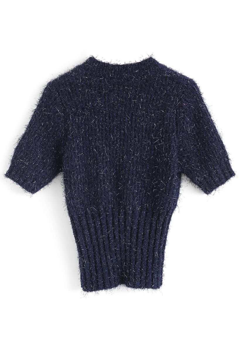 Suéter de punto de manga corta brillante y esponjoso en azul marino