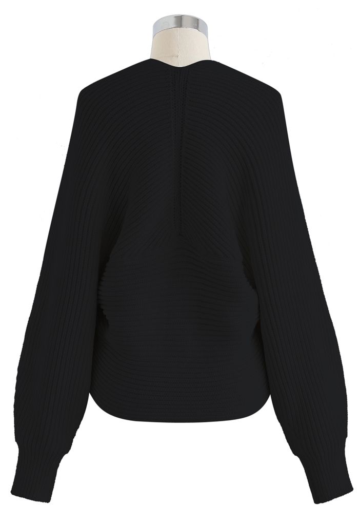 Suéter corto de punto acanalado entrecruzado en negro