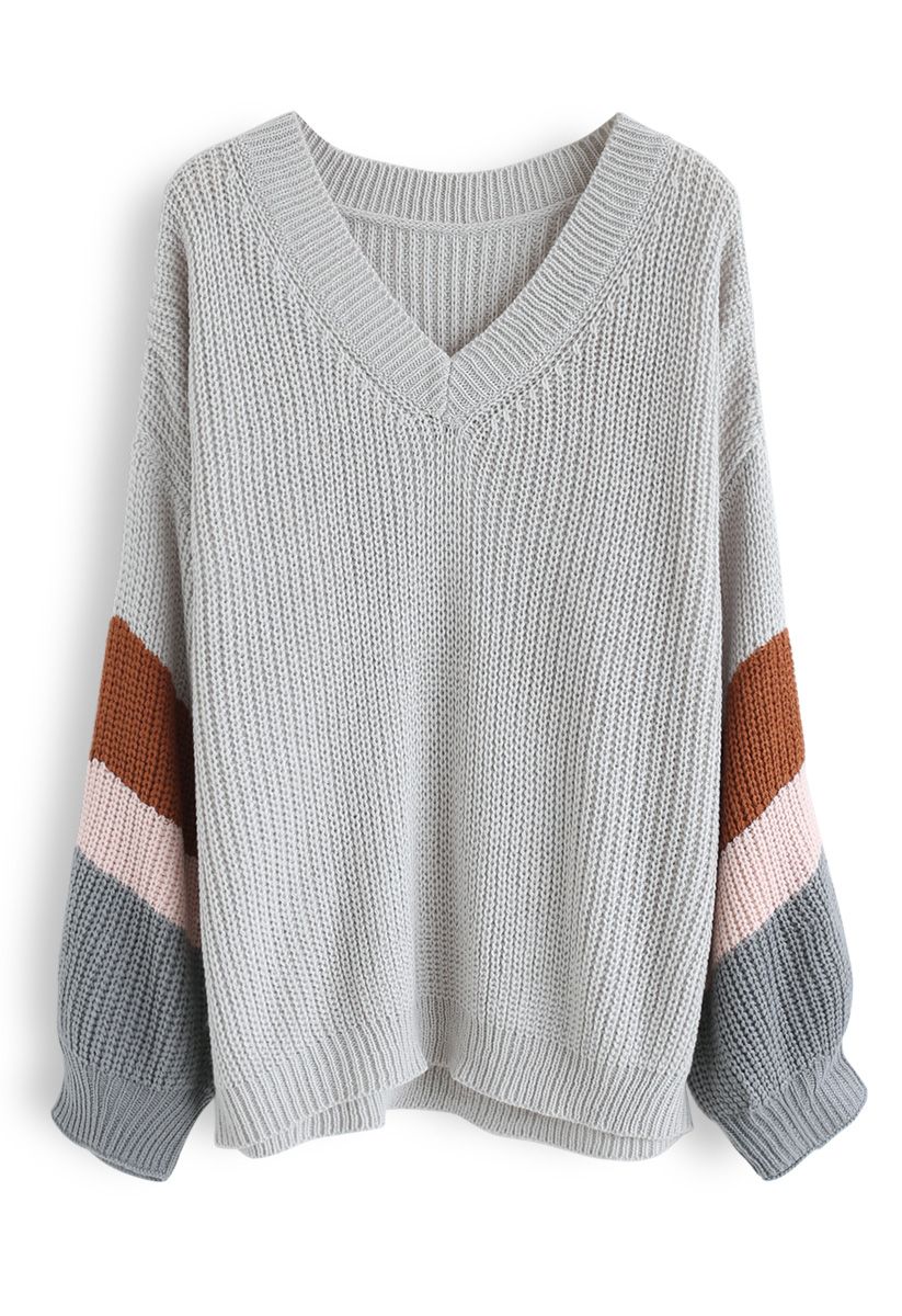 Suéter de punto con cuello en V y mangas color block en gris