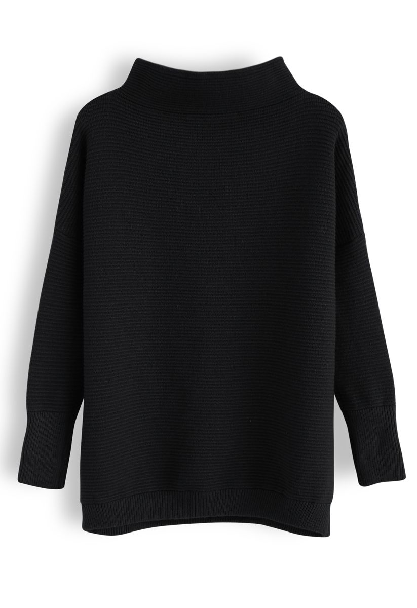 Suéter de cuello alto acanalado acogedor en negro