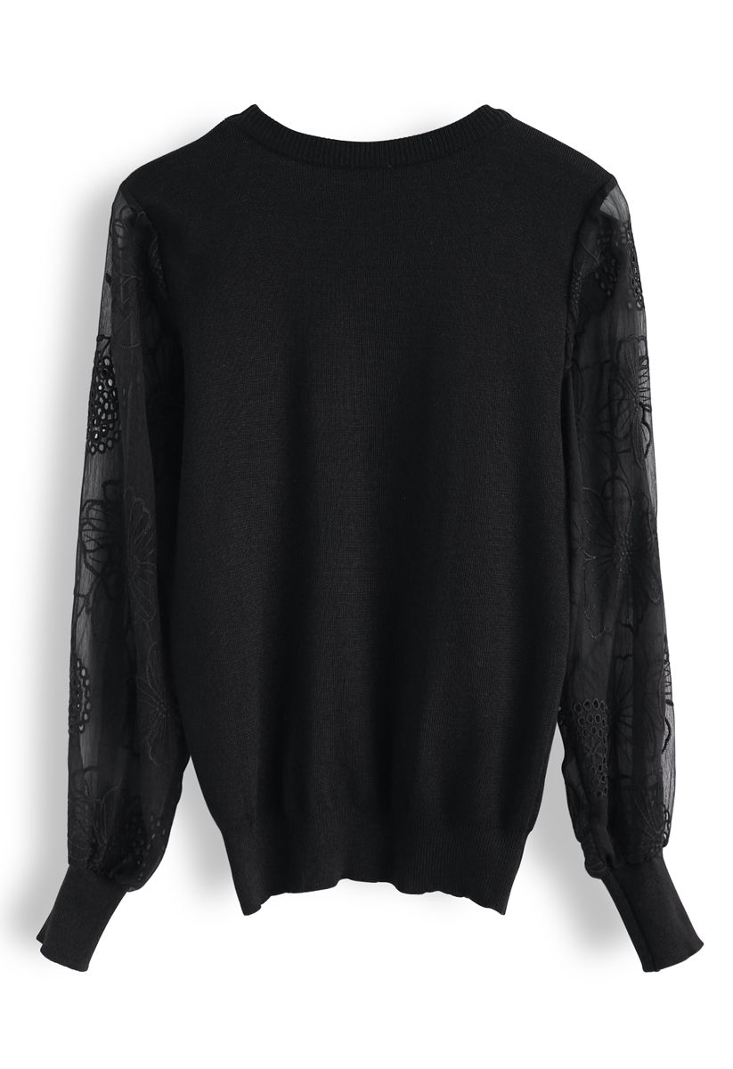 Suéter de punto con mangas transparentes y bordado floral en negro