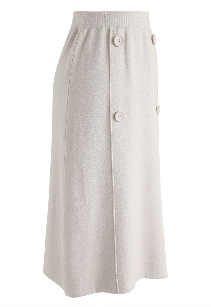 Falda midi de punto con ribete de botones en color crema