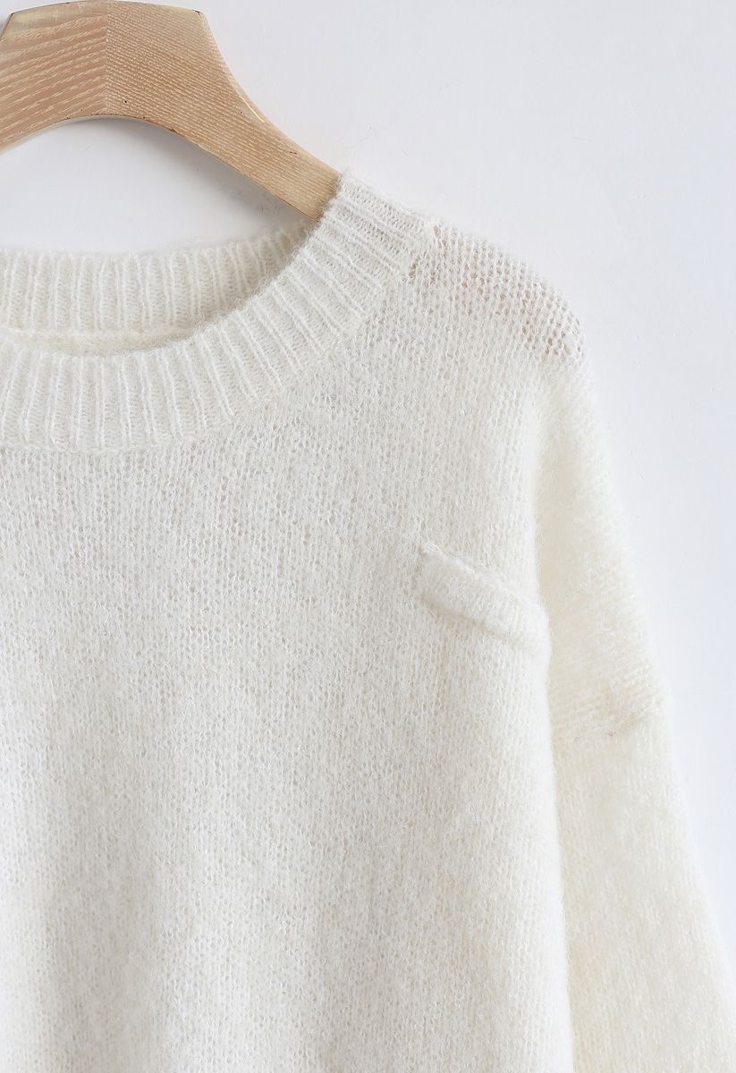 Suéter de punto extragrande con dobladillo alto y bajo en blanco