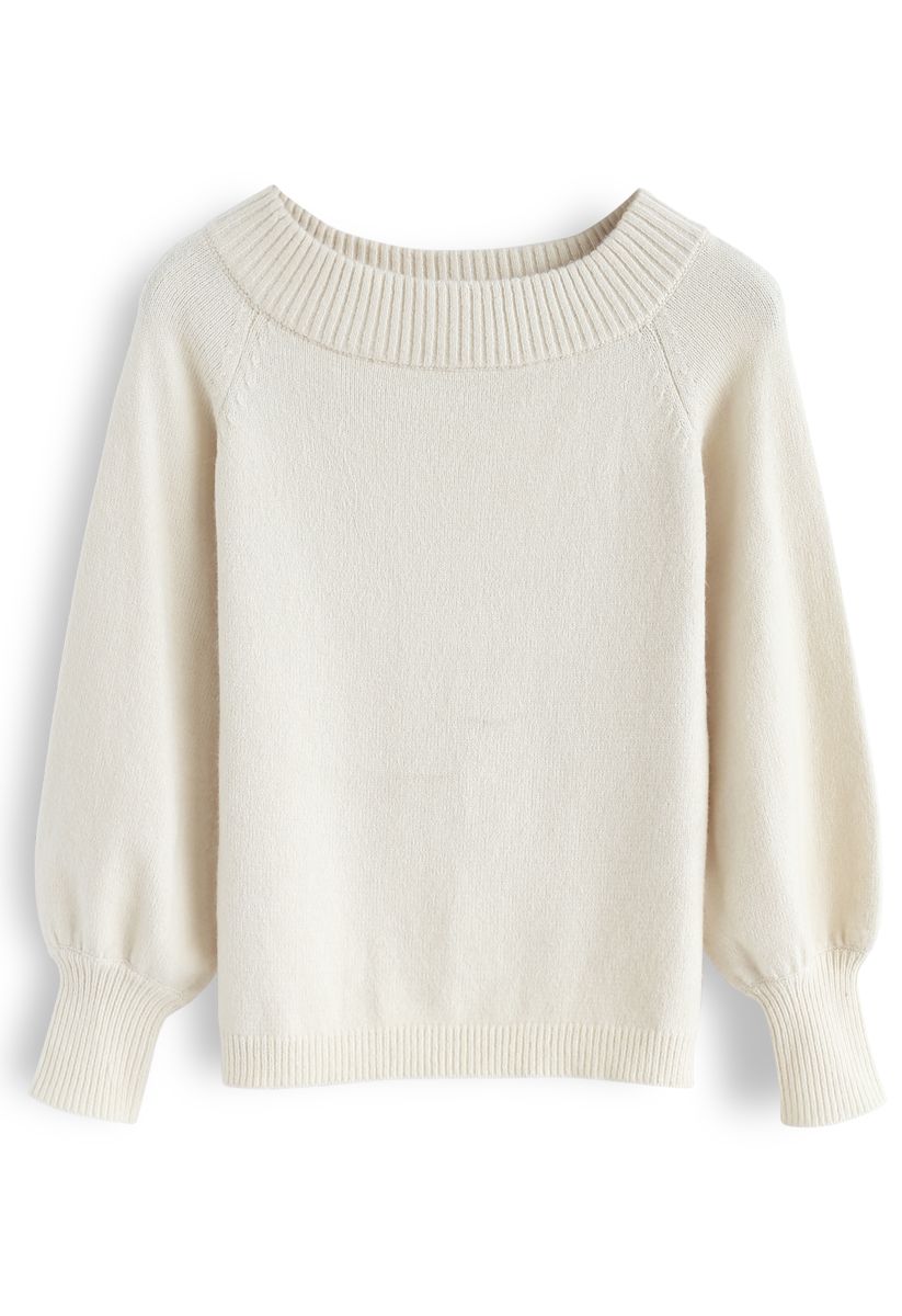 Suéter de punto esponjoso con hombros descubiertos y mangas abullonadas en color crema