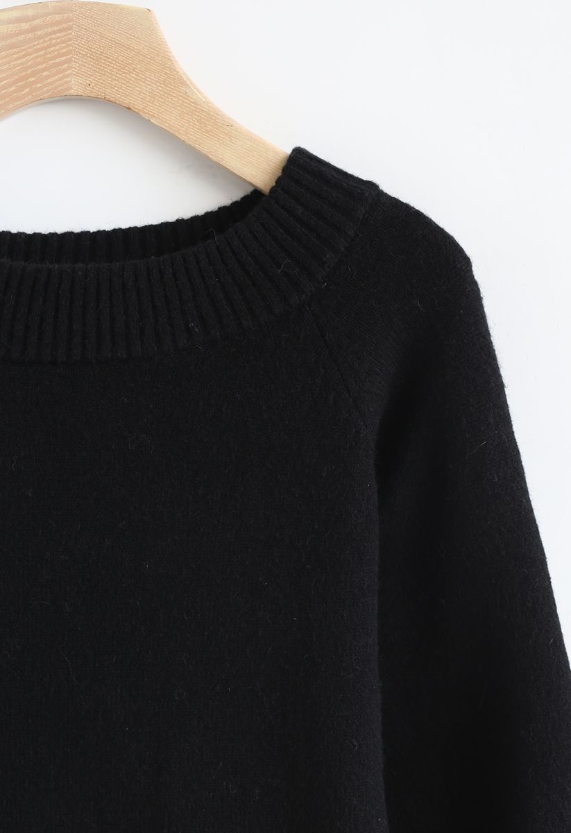 Suéter de punto esponjoso con hombros descubiertos y mangas abullonadas en negro