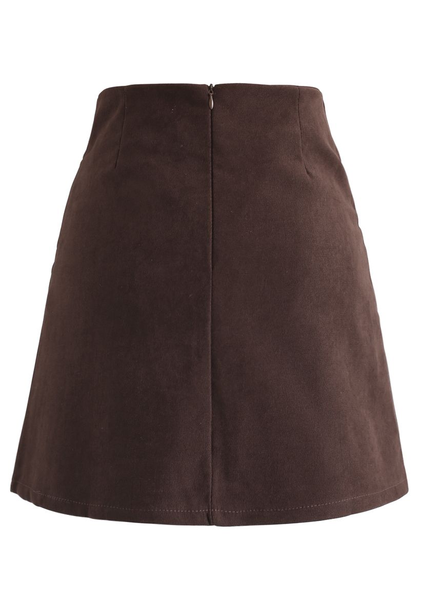 Minifalda plisada con solapa en marrón