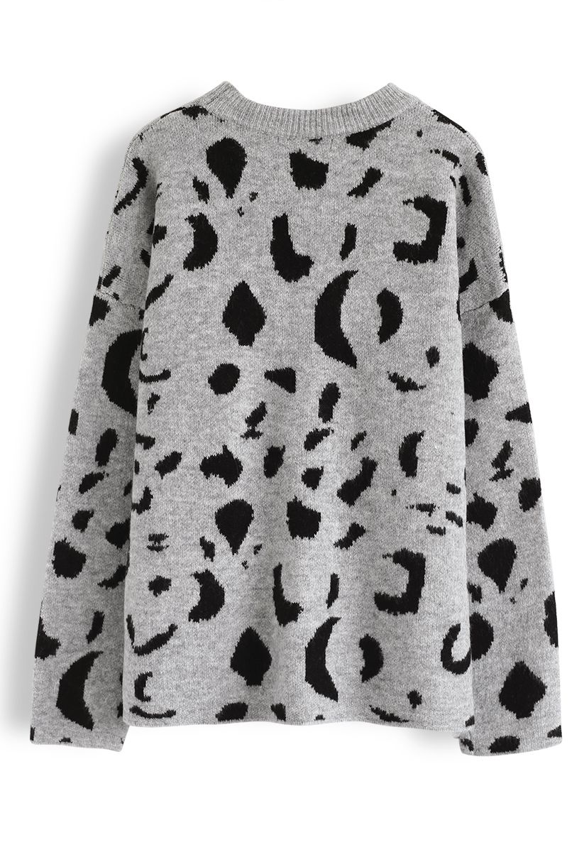 Suéter de punto suelto con patrón de tinta en gris