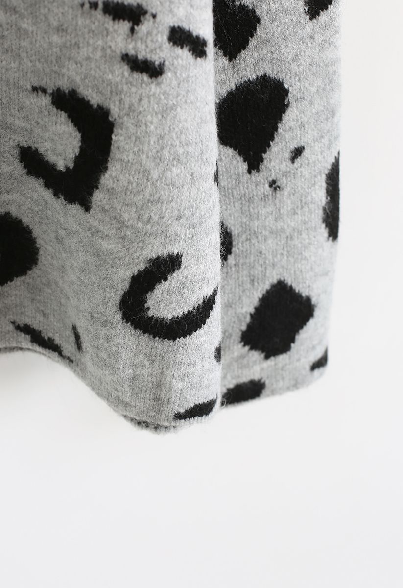 Suéter de punto suelto con patrón de tinta en gris