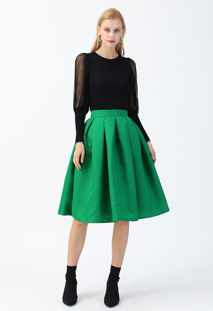 Falda midi plisada con textura ondulada en verde