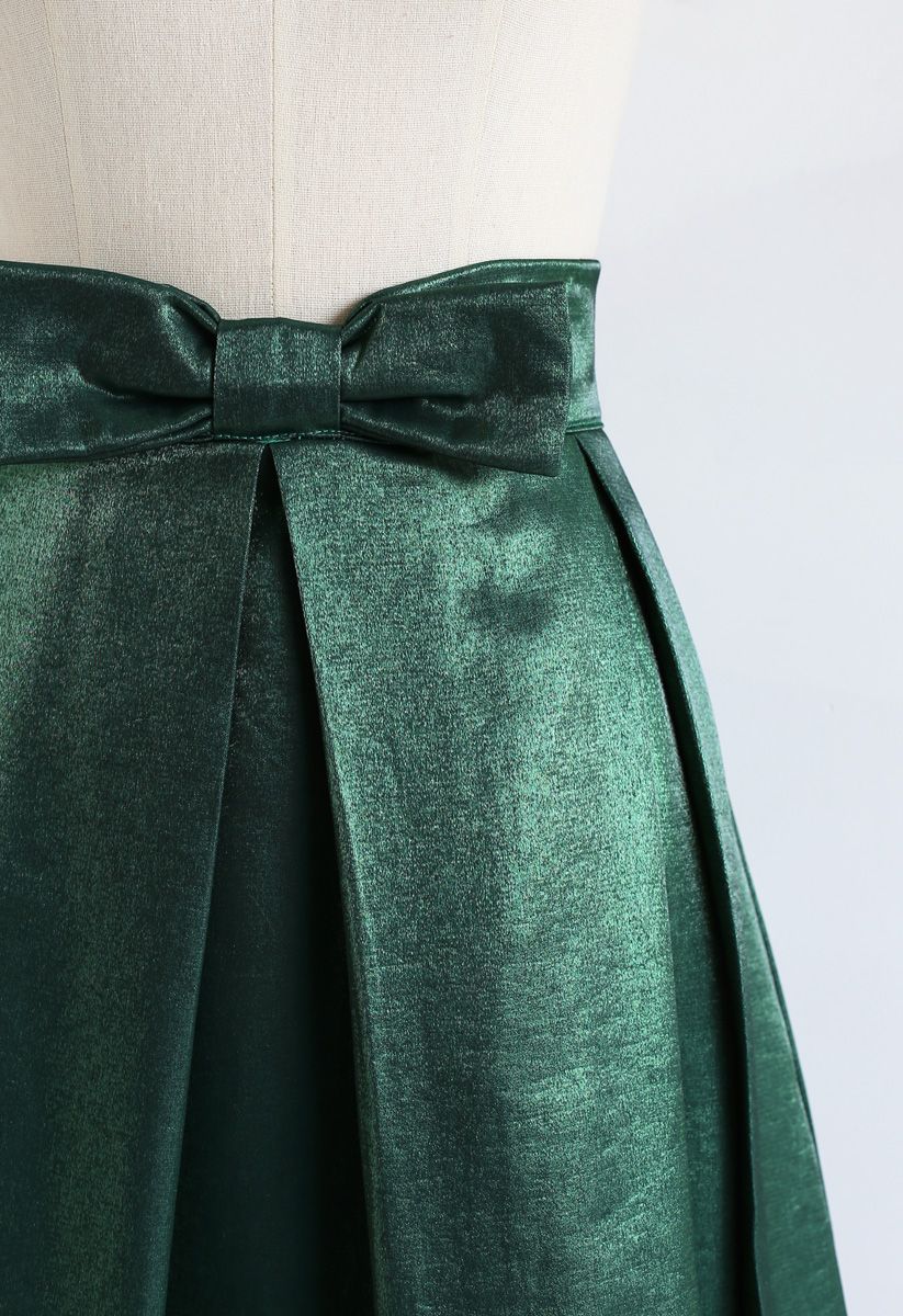 Falda midi plisada con lazo de satén esmeralda